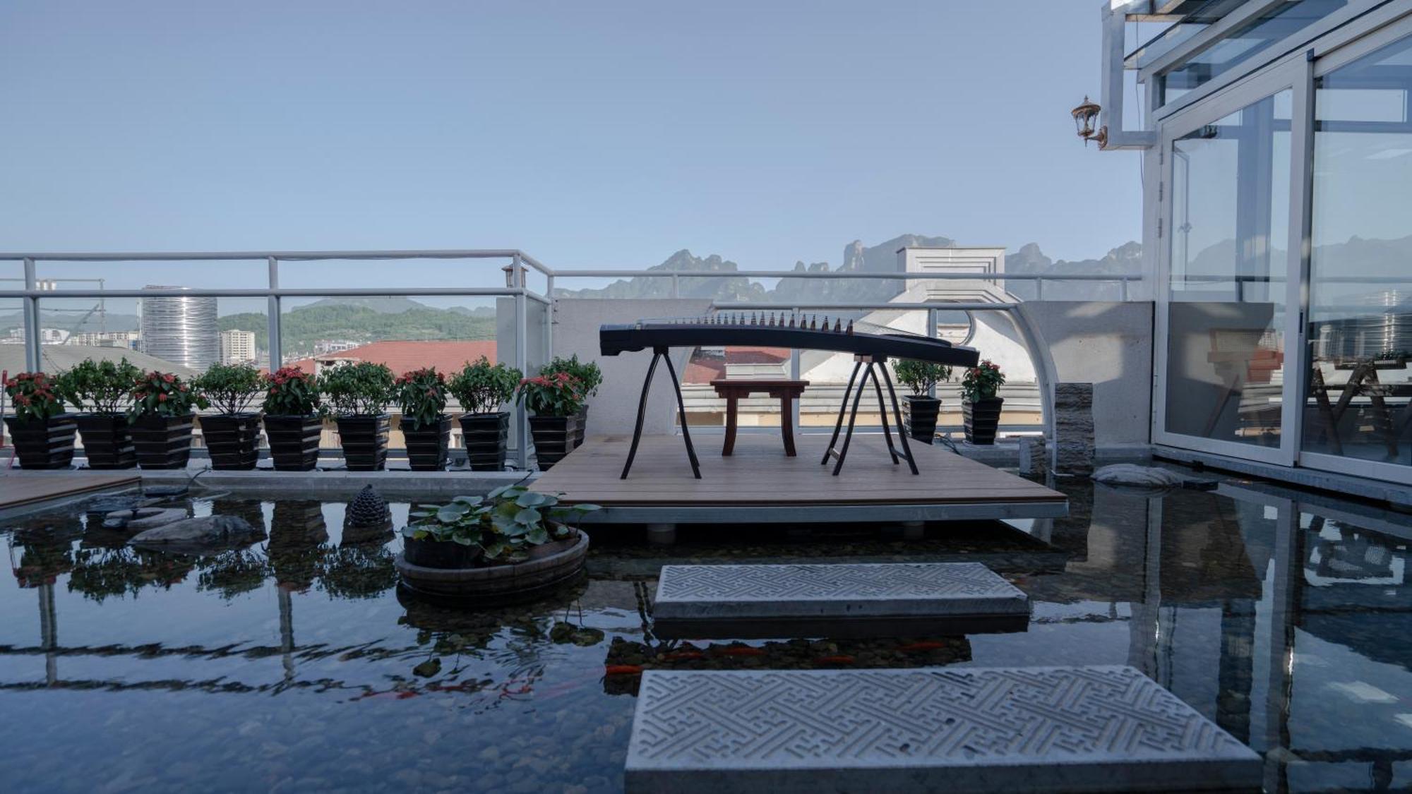 Patio Spring Holiday Inn -- Free Round Trip Pick-Up Service --Panoramic View Of Tianmen Mount Zhangjiajie Dış mekan fotoğraf